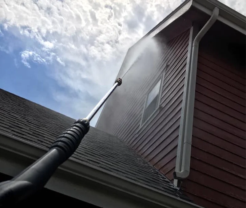 How Can Roof Cleaning Protect My Shingles This Summer?